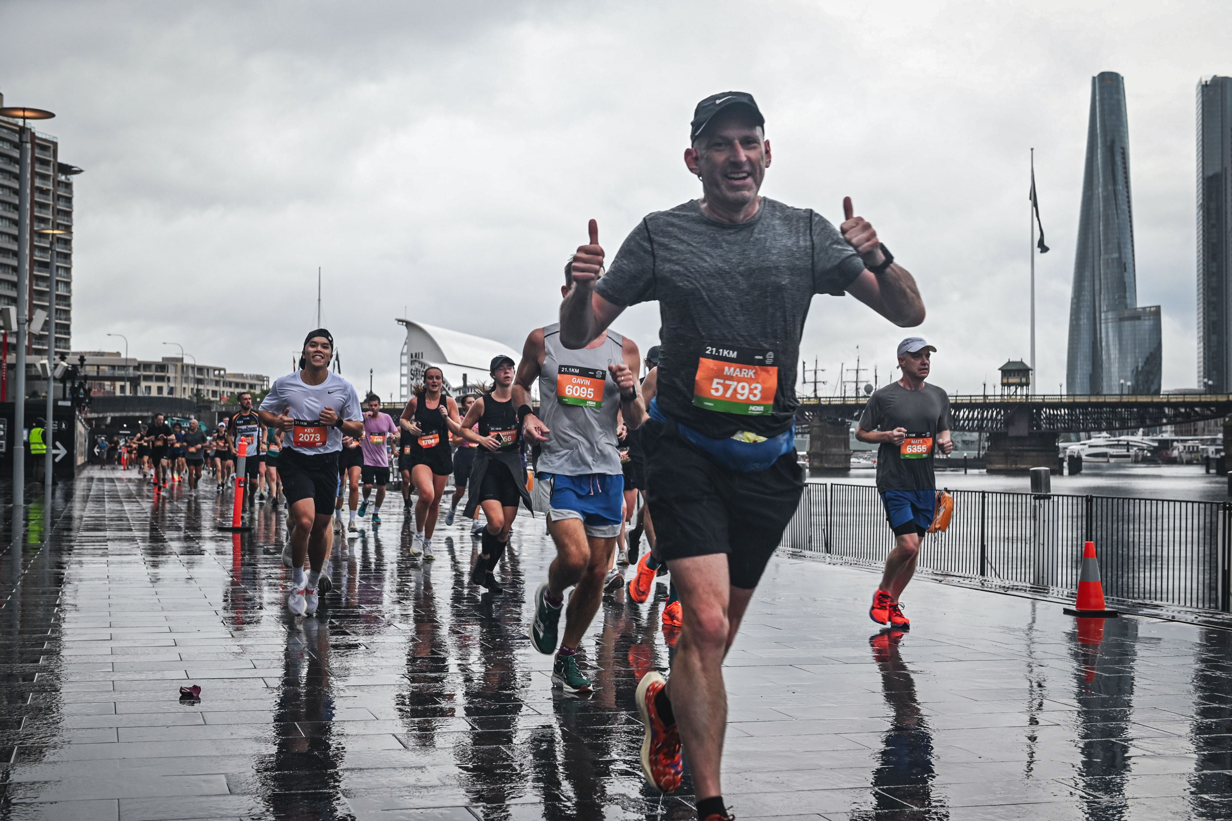 Mark running in the rain